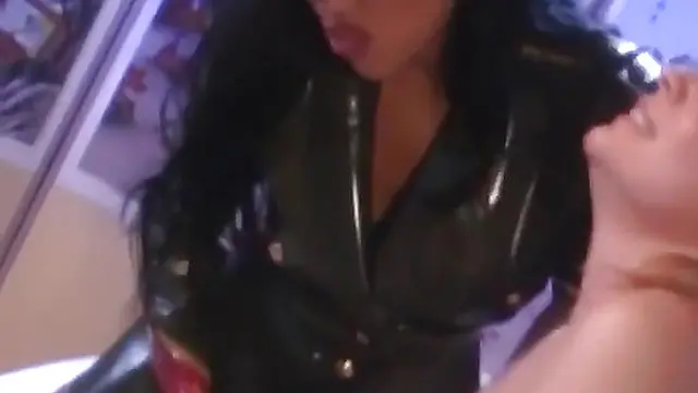 PussyCatsLatex com - Big ass lesbian's paddling submission to leather-clad mistress