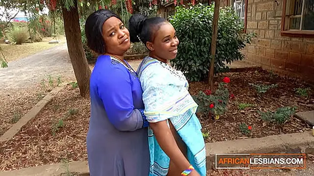 African MILF Lesbians Kiss Publicly At House Party