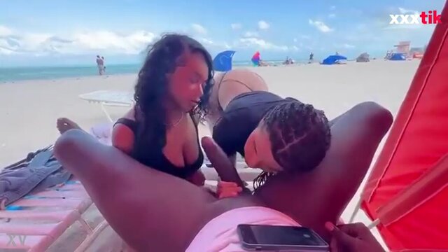 Ebony sluts suck massive BBC in public