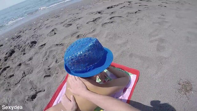 Gorgeous Goddess SexyDea shows off her enormous booty at the beach