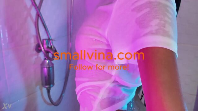 Cute amateur petite Asian girl twerks in the bathroom