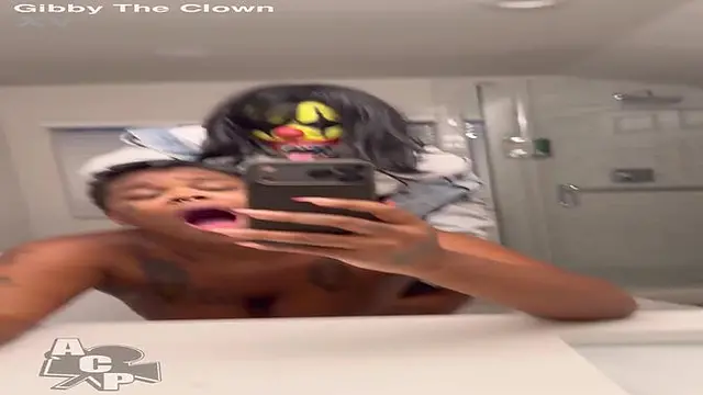 Ebony baddie with a thick booty gets her ass pounded by Gibby the clown